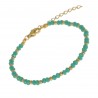 Bracelet en Acier doré et pierres vertes
